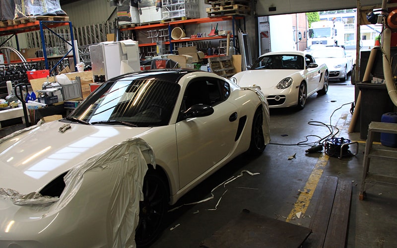 carwrap van verschillende porsches naar het wit